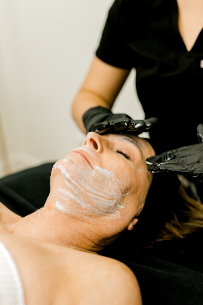 woman getting facial treatment