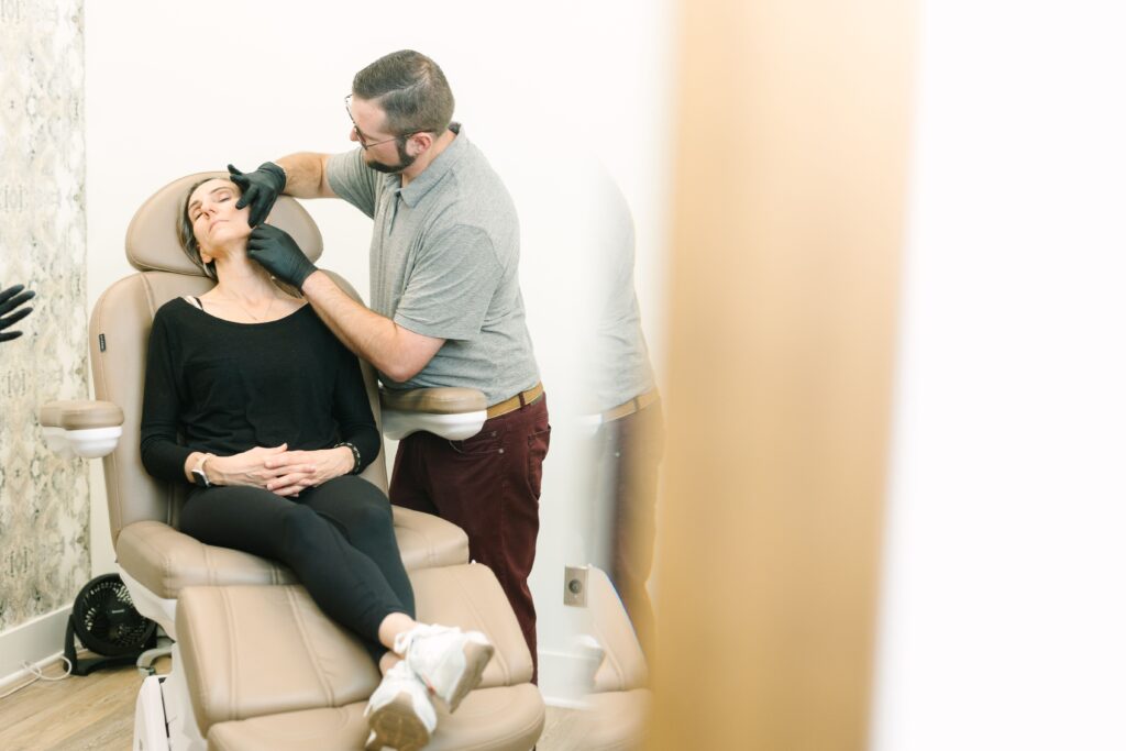 woman getting facial treatment